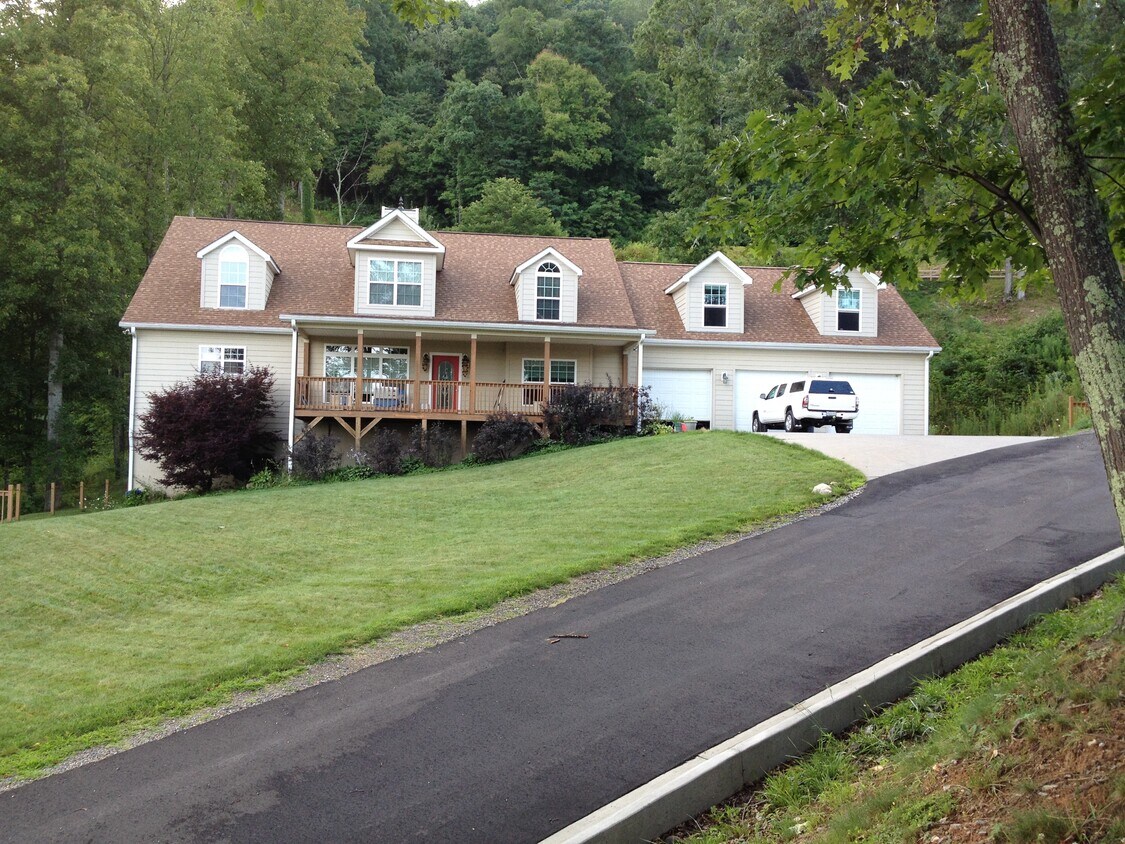 Front of house, porch available to use. - 97 Mount Soma Blvd (Clyde, NC)