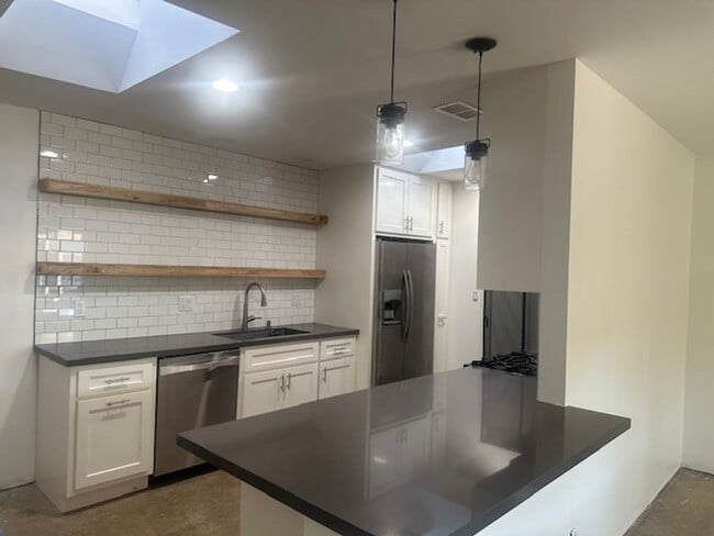 Photo - AMAZING INTERIOR 4 BEDROOM / 2 BATHROOM RE...