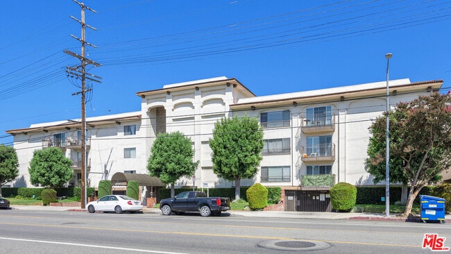 Building Photo - 12801 Moorpark St Unit 313 Rental