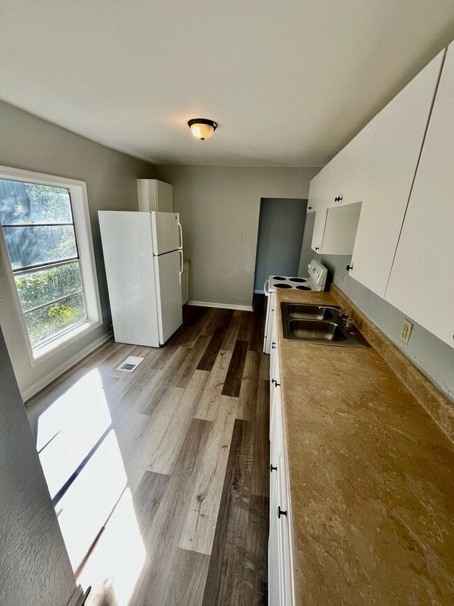 Photo - 3BR/1BA with HUGE Backyard, LVT Wood Floor...