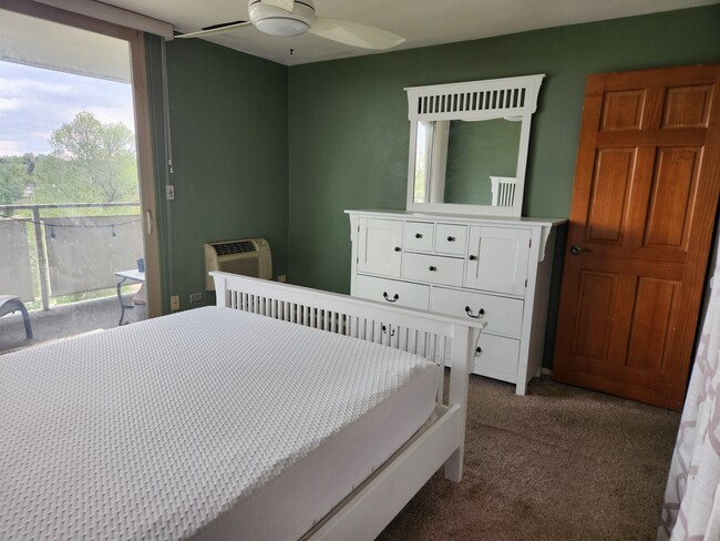 Photo - 4600 E Asbury Cir 512 Unit Bedroom A