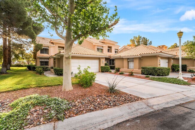 Building Photo - Charming Guard-Gated Southwest Las Vegas Townhome with Fireplace & Golf Course Views!