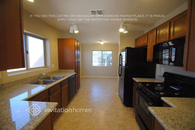 Photo - 12563 W Charter Oak Rd