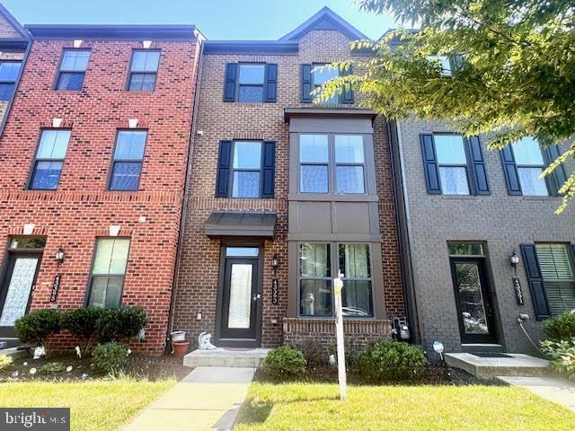 Photo - 43393 Charitable St Townhome