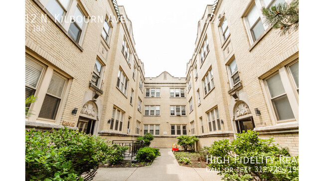 Building Photo - 2412 N Kilbourn Ave Unit 2412-1 Rental