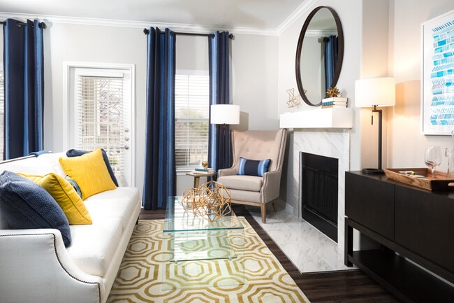 Fireplace with modern mantle and Carrara-style tile surround available