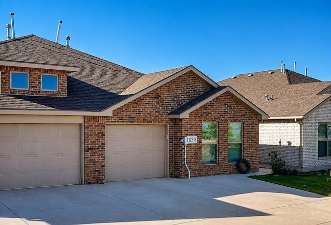 Building Photo - 2127 N Texas Ave Unit B