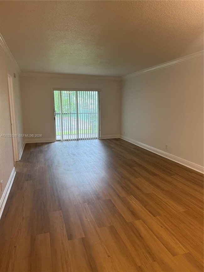 Building Photo - 5080 SW 64th Ave Unit 208