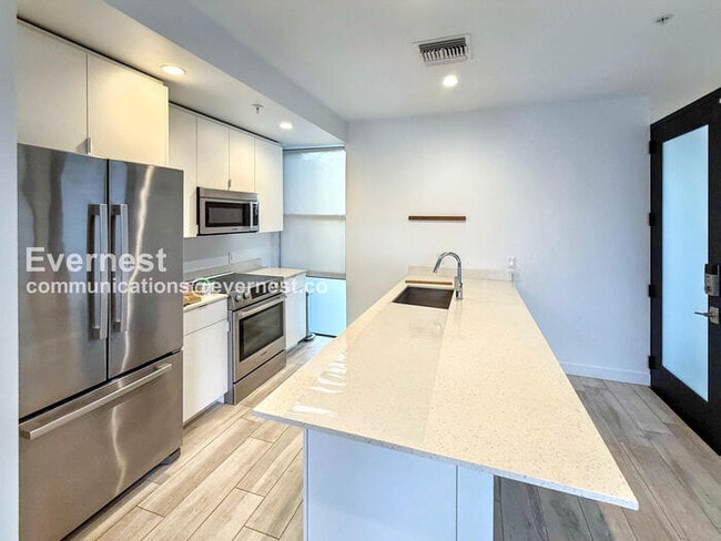 Building Photo - 1717 N 1st Ave Unit 222