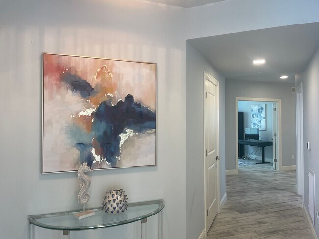 Photo - Coastal Luxury at Hidden Bay | 3BR Waterfront Condo with Bay Views
