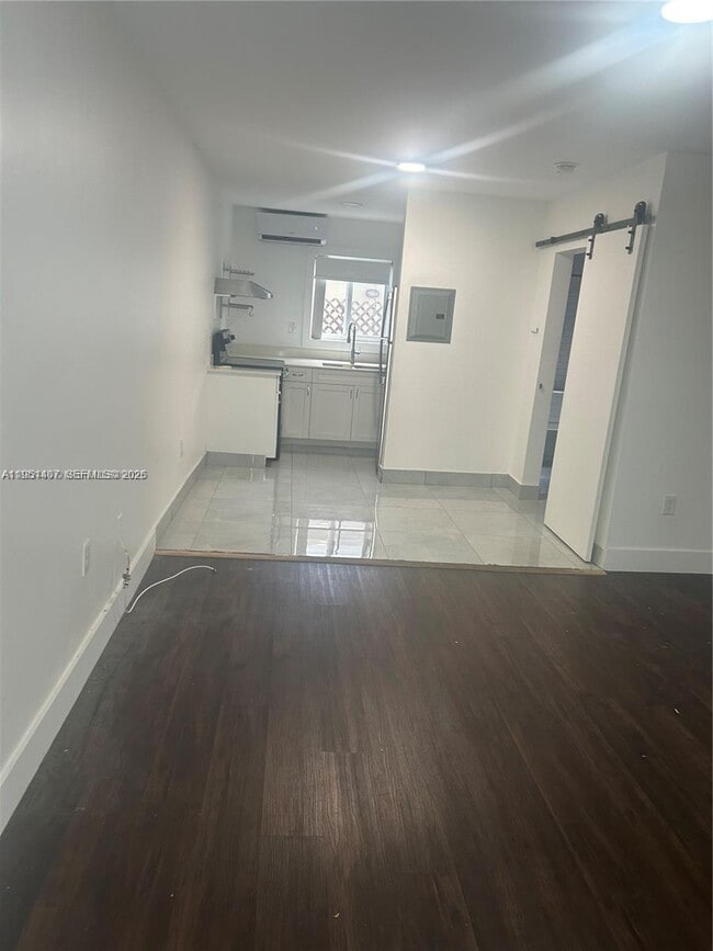 Building Photo - 8260 Byron Ave Unit 13