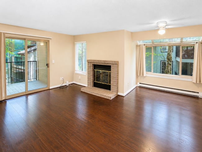 Building Photo - Modern Wooded Condo with Upgraded Kitchen & Private Deck