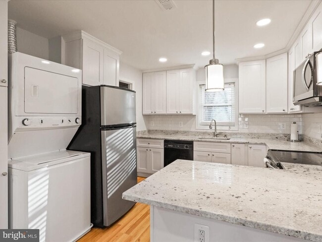 Photo - This home blends urban accessibility with peaceful natural surroundings.