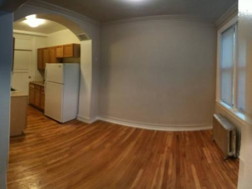 Building Photo - 1365 W Estes Ave Unit 1V Rental