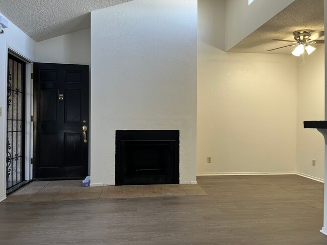 Photo - Cozy 2nd story apartment in the heart of City Heights.  Vaulted ceilings, fireplace, onsite laundry