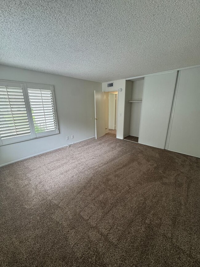 Photo - Resort-Style Condo Living with Pool Access & Community Amenities