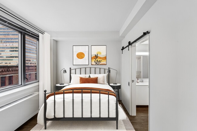 Bedroom with hard surface flooring - AVA High Line