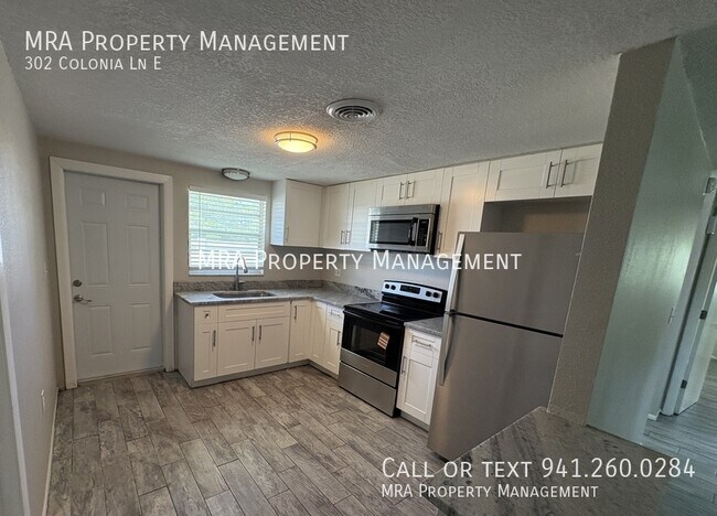 Photo - 302 Colonia Ln E