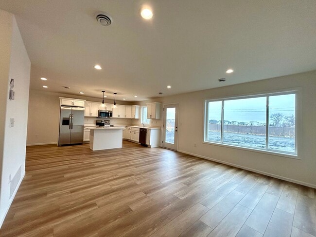 Photo - Spacious & Stylish 3-Bed Home with Modern Finishes and Attached 2-Stall Garage