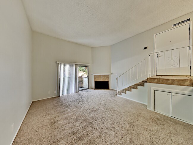 Living Room with view of balcony - 5500 Lindley Ave Unit 111