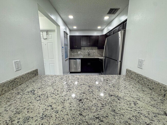 Photo - 10687 Royal Palm Blvd