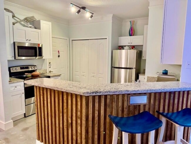 Photo - 2 Bedroom/ 2 Baths / 2 Car Garage Condo Fo... Unit 108