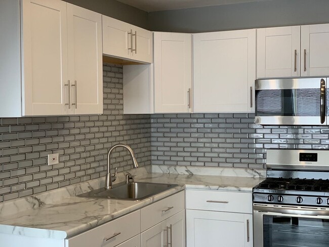Building Photo - 6149-6151 S Evans Avenue Unit 6149-2