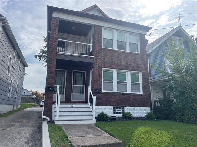 Building Photo - 731 E 28th St Unit 1