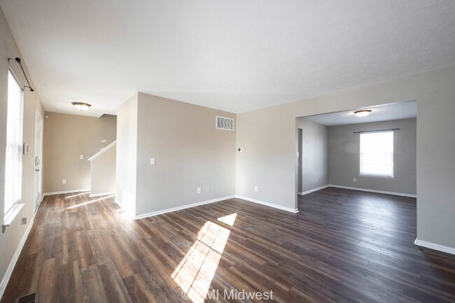 Photo - "Spacious 4-Bedroom Gem with Finished Base... Apartment