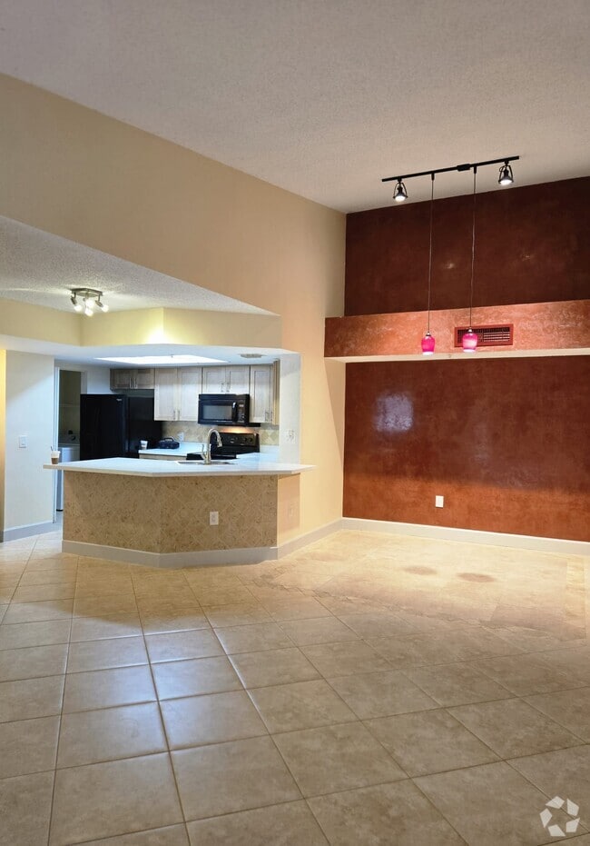 Building Photo - 5025 Wiles Rd Unit 307 Rental