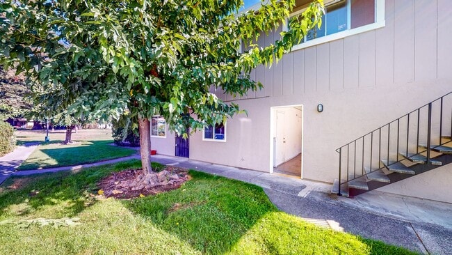 Photo - 2 story 2 bedroom 1 bath condo with covered parking, private storage and community pool!