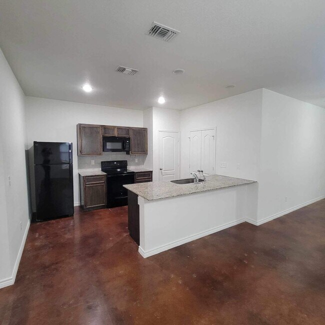 Photo - 6101 Amelia Earhart Blvd Unit A