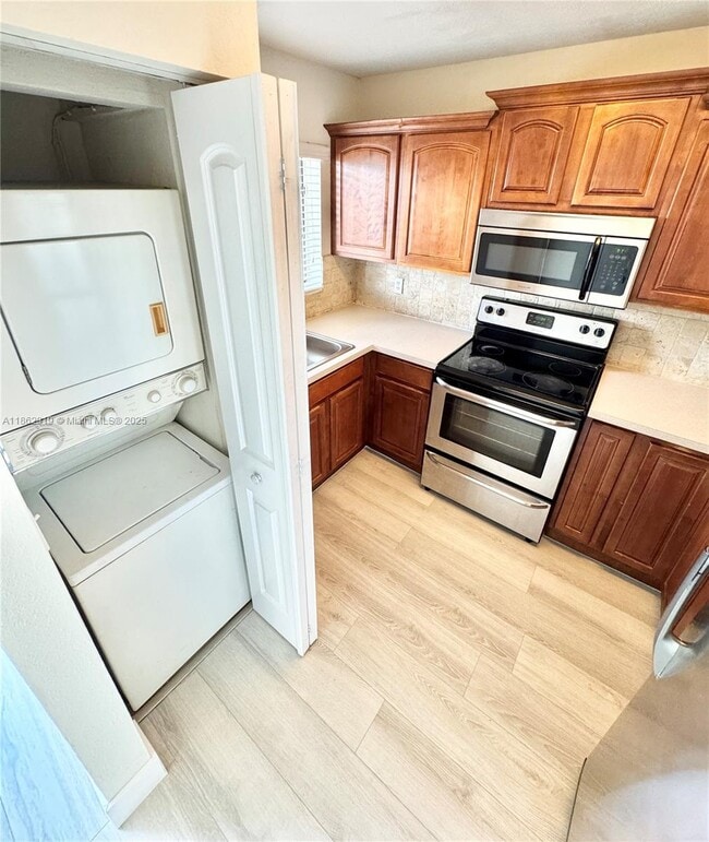 Building Photo - 6121 W 24th Ave Unit 204 Rental