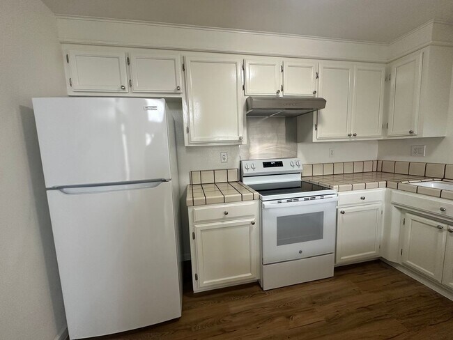 Photo - Spacious 3-Bedroom Home with Large Yard, 2-Car Garage & Modern Updates!