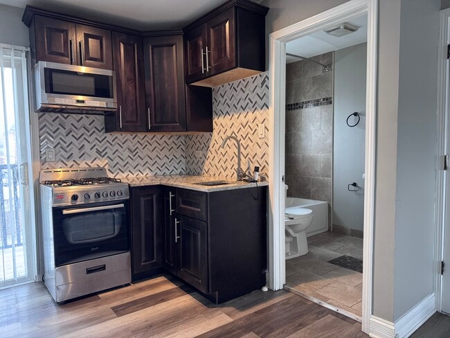 Full Kitchen, Gas Stove and built in Microwave - 9909 S Ridgeland Ave