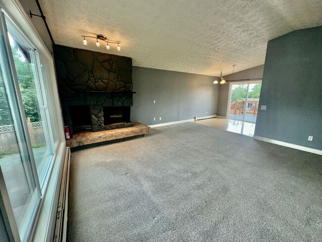 Photo - HUGE BACKYARD, 4 BED 2 BATH, HEATED GARAGE HOME!