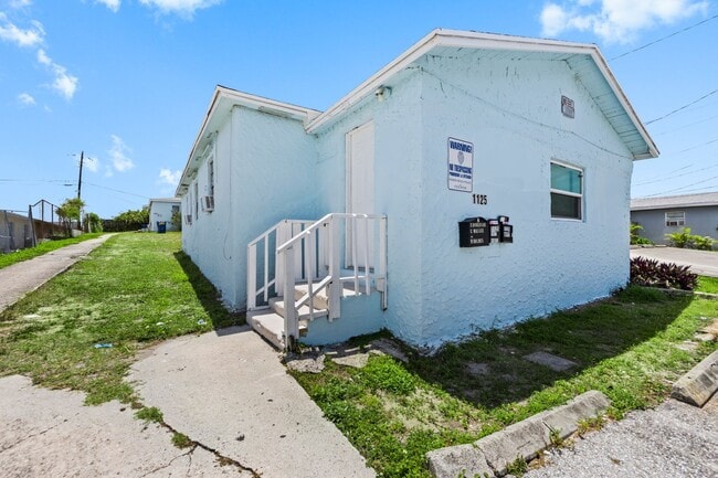 Building Photo - 1125 W 28th St Unit A FRONT SINGLE FAMILY HOUSE