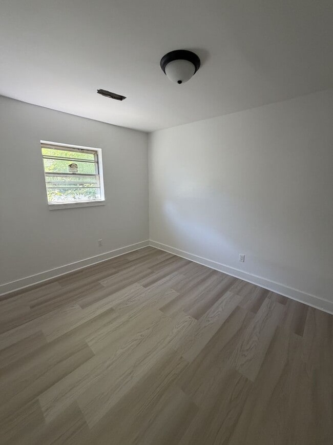 Photo - A spacious and inviting 4-bedroom, 2-bath unfurnished home
