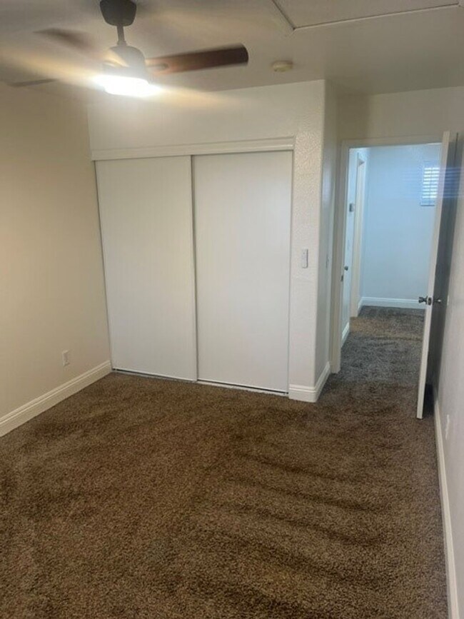 Photo - This three bedroom has the primary bedroom on the downstairs level.