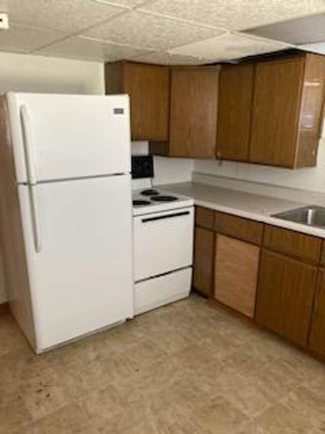 Building Photo - $900 - 2 Bedroom 1 Bath Duplex - Close to South Dakota School of Mines!