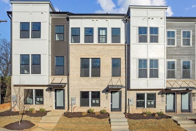 Photo - High-End 2BR Townhome | Rooftop Terrace + 2-Car Garage | 24-Unit Community