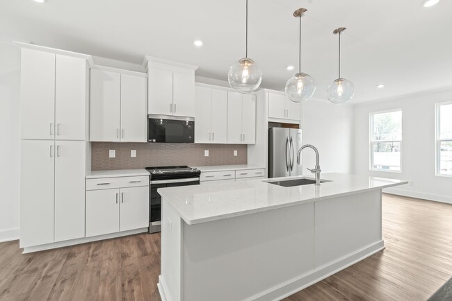 Photo - New Construction in LoSo! Townhome