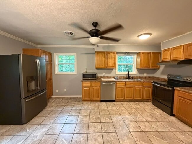 Photo - 3 Bedroom 2 Bathroom Ranch style home with full finished basement. Lawncare included, Pets allowe...