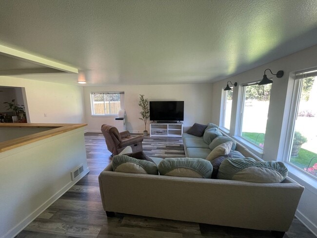 Photo - Charming 4-Bedroom with Open Floor Plan & ...
