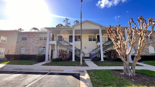 Building Photo - Stylish 2BR/2BA Condo in the Heart of Oviedo – Comfort, Convenience & Resort-Style Living! WASHER...