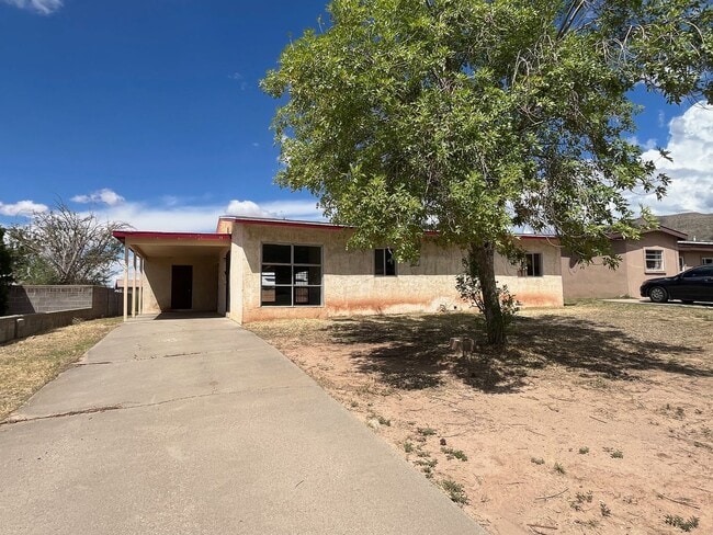 Building Photo - Three bedroom home with large fenced-in ba...