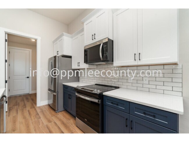 Photo - Brand new 4 bedroom 2 bath 3 car garage po...