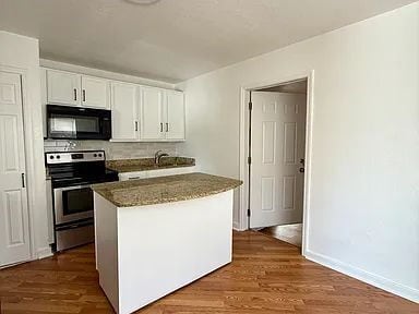 Photo - Charming Centrally Located Home | Wood Floors + Fenced Yard