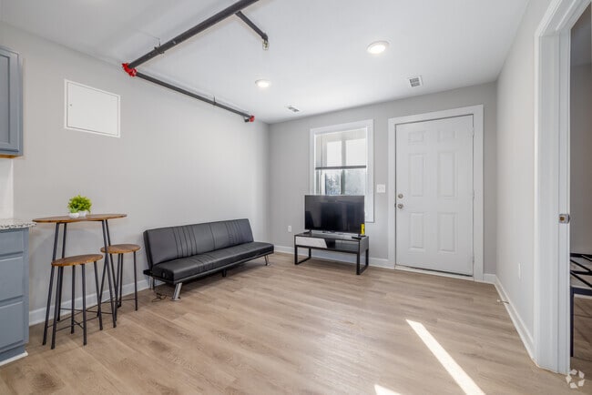 Coach House - 1BR, 1BA - 412SF - Living Area - University Digs Apartments