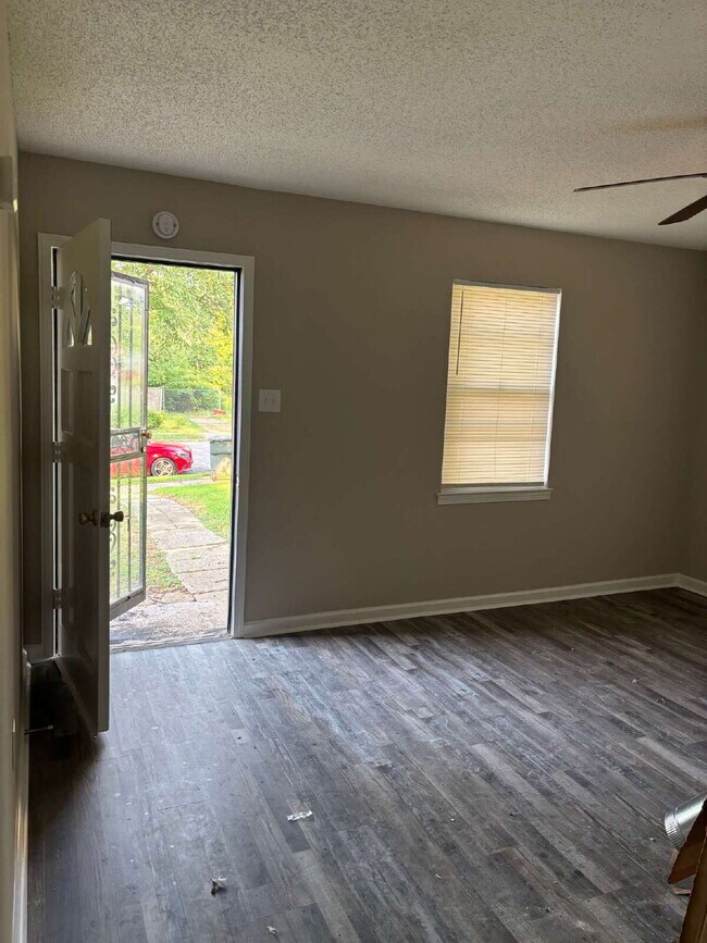 "Charming 3-Bedroom Retreat on Suncrest Drive with Gleaming Hardwood Floors!"